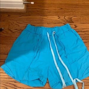 High waisted blue flowy shorts